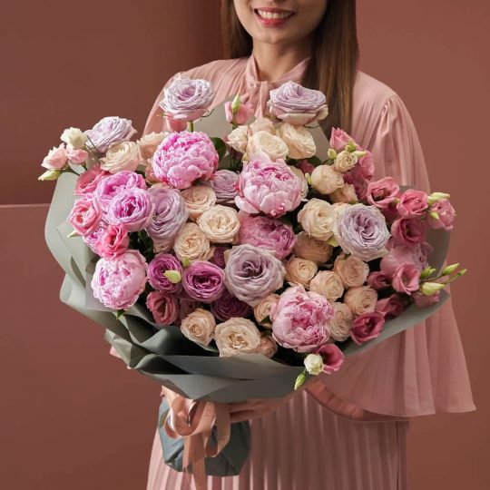 girl holding Birthday Flower Bouquet